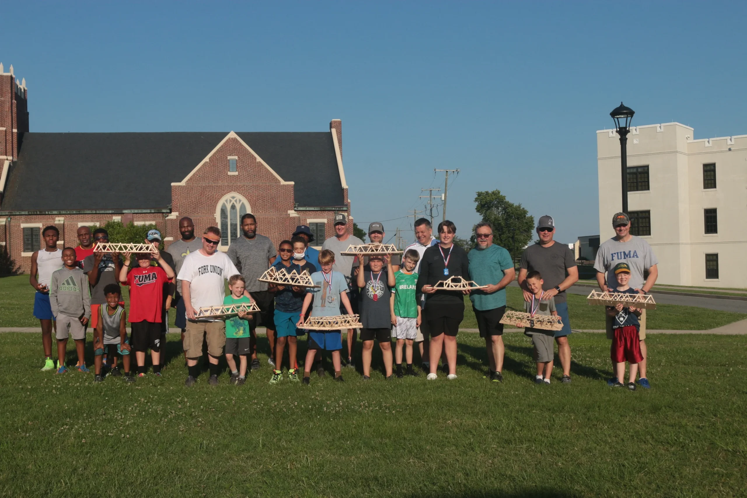 Fathers and sons together inside the FUMA chapel during Father-Son Weekend.