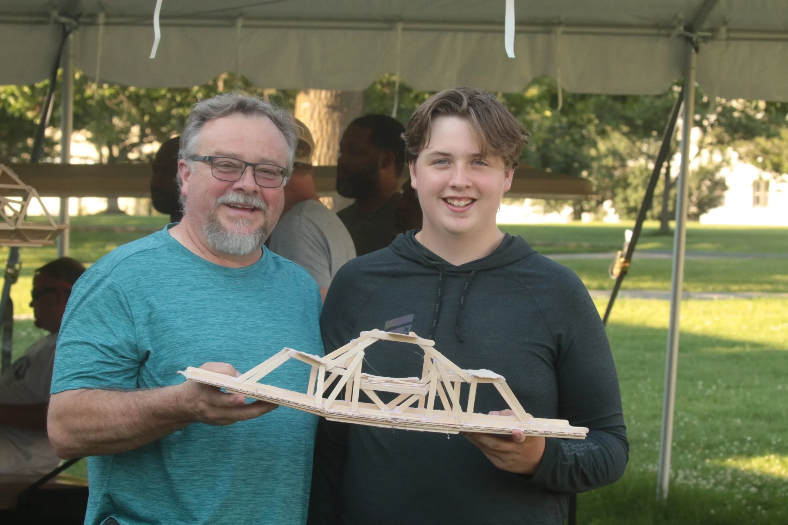 A father and son walking together at Fork Union Military Academy's Father-Son Weekend.