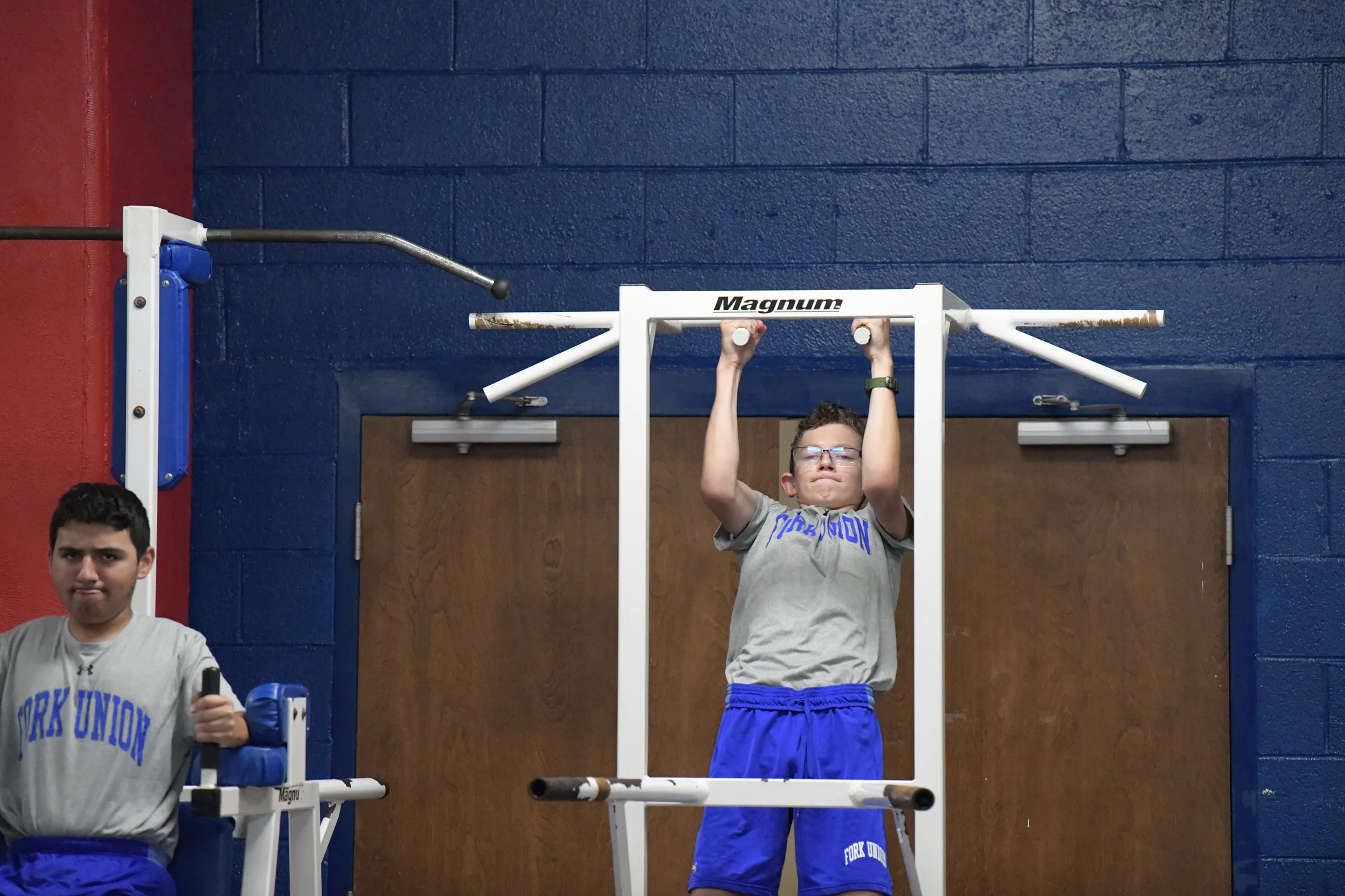 Summer programs for unmotivated teens: a FUMA Summer Academy cadet leading morning PT.